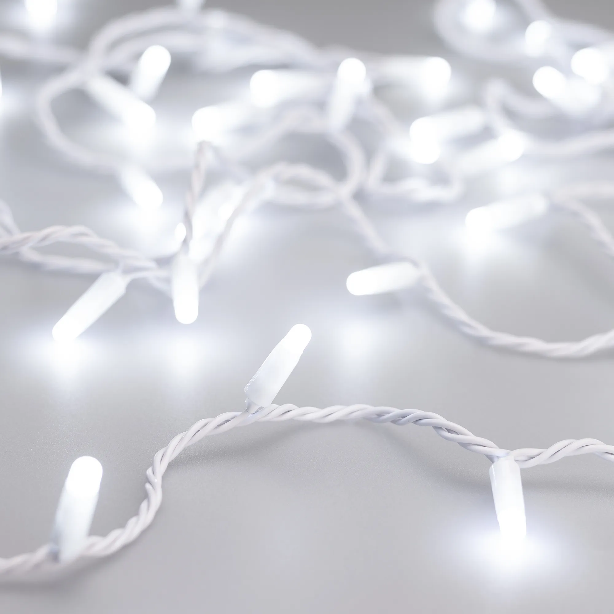 Светодиодная гирлянда ARD-STRING-CLASSIC-10000-WHITE-100LED-MILK-STD White (230V, 7W) (Ardecoled, IP65) - Изображение